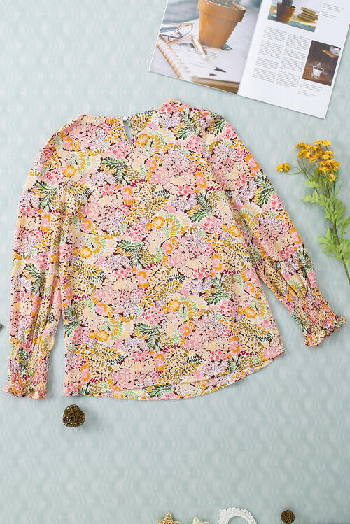 Blusa de manga larga con estampado floral