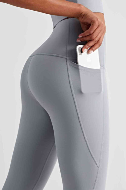 Leggings deportivos de cintura ancha con bolsillos laterales