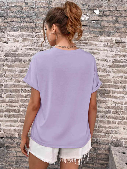 Camiseta con cuello redondo y manga con puños