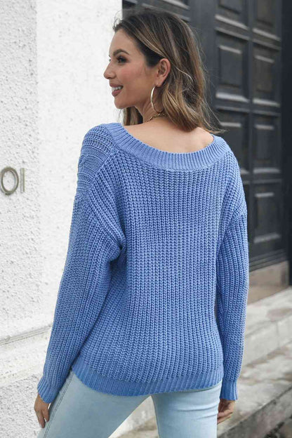 Jersey de punto trenzado con cuello en V