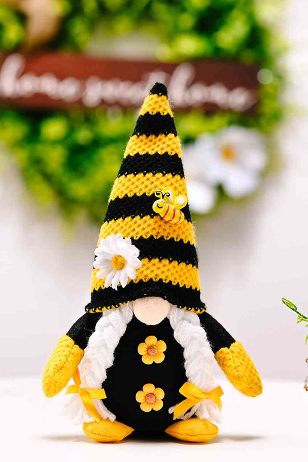 Gnome sans visage à décor d'abeille et de fleurs