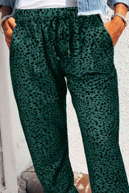 Pantalones largos con bolsillos de leopardo