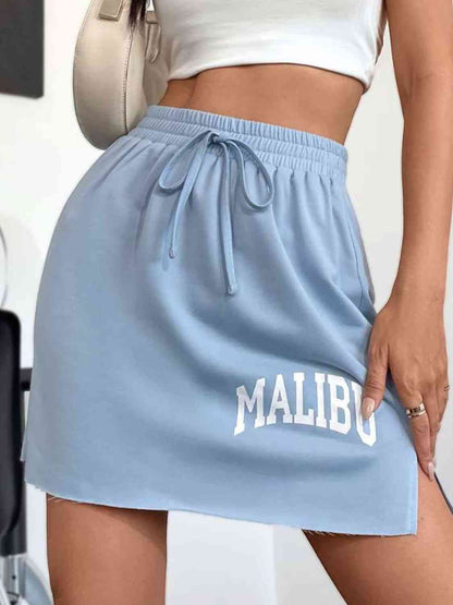 Falda con abertura y cordón gráfico MALIBU