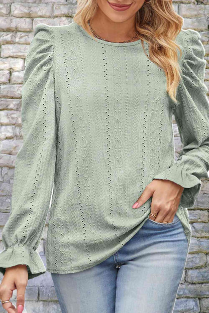 Blusa con cuello redondo y manga abullonada