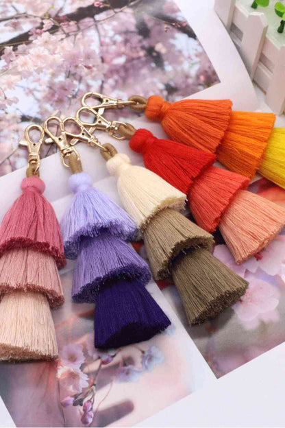 Assortiment de 4 porte-clés à franges multicolores