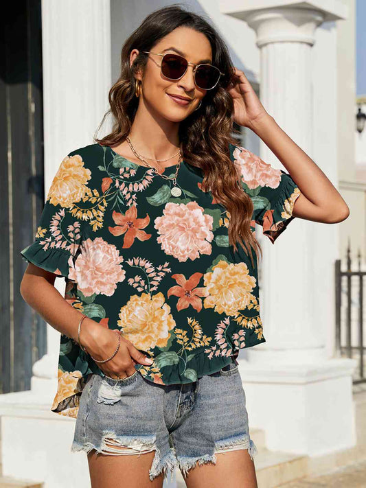 Blusa floral con mangas con volantes y volantes