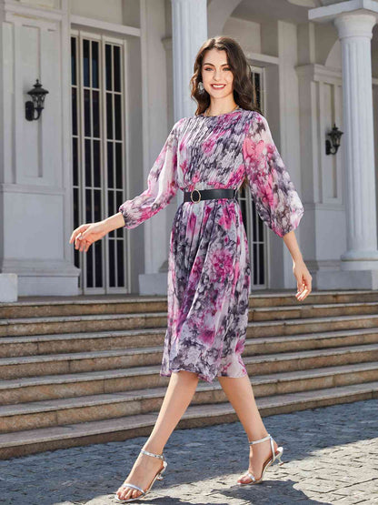 Vestido midi con estampado floral, cuello redondo y manga globo