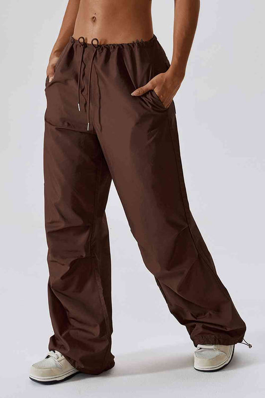 Pantalon de sport long avec poches, coupe ample