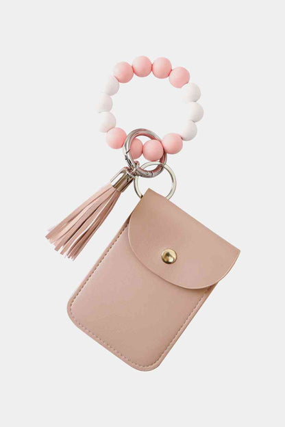 Llavero con pulsera de cuentas y cartera