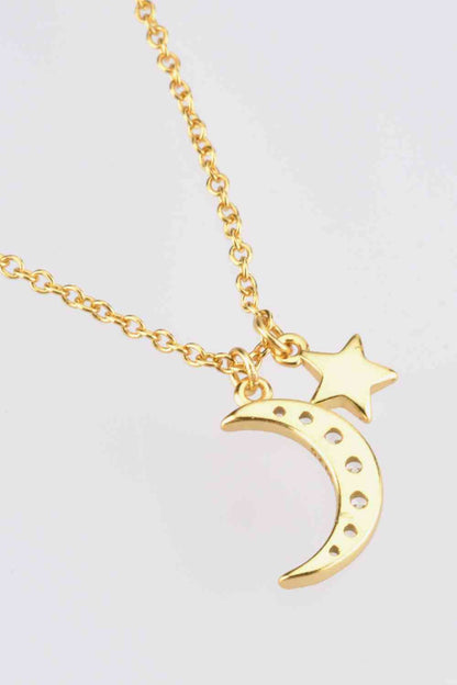 Collar con colgante de estrella y luna de circonitas