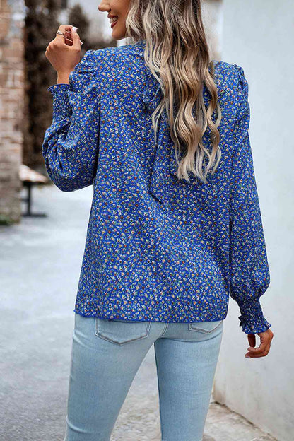 Blouse smockée imprimée à manches bouffantes