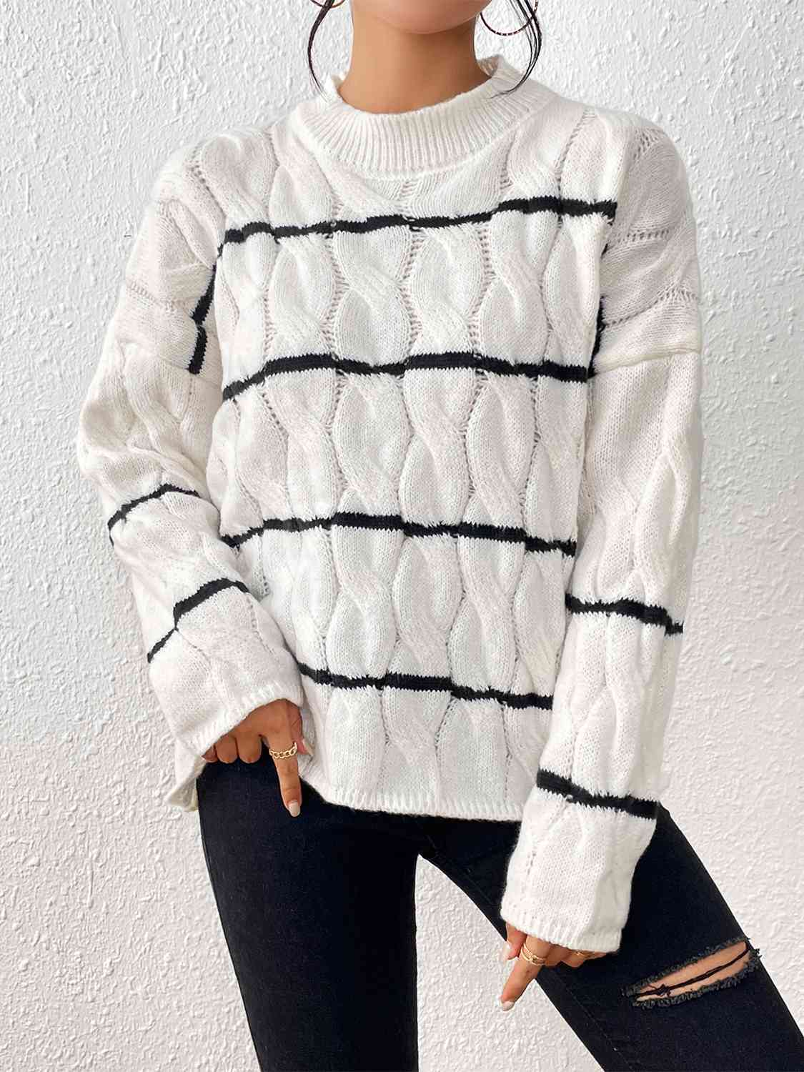 Pull rayé en maille torsadée