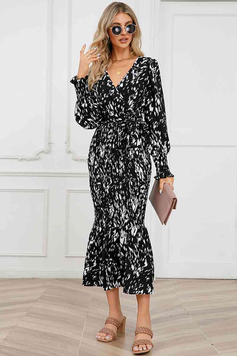 Robe midi smockée imprimée à col en V