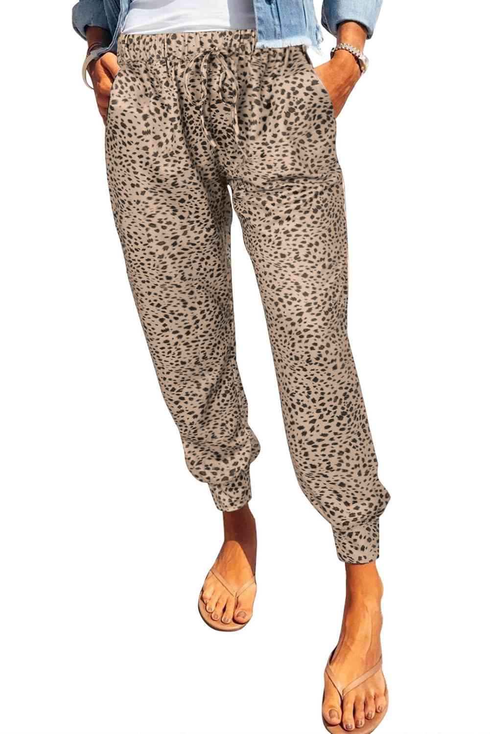 Pantalones largos con bolsillos de leopardo