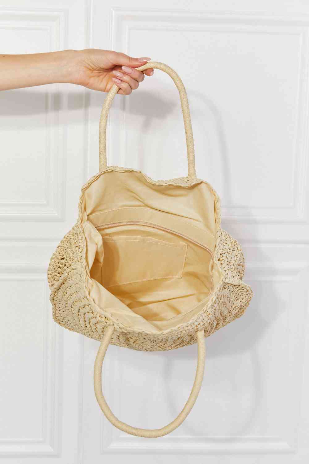 Bolso de mano de mimbre y paja Beach Date de Justin Taylor en color marfil