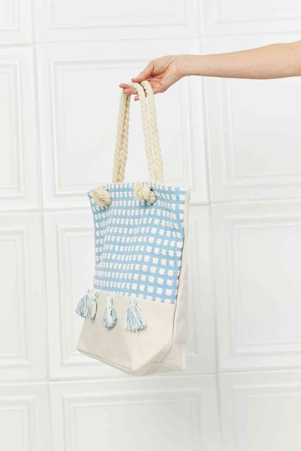 Bolso tote con borlas y fecha de picnic de Justin Taylor