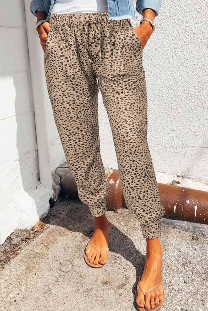 Pantalones largos con bolsillos de leopardo