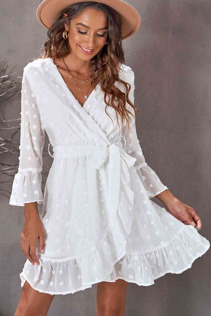 Robe surplis à volants et à taille nouée à pois suisses