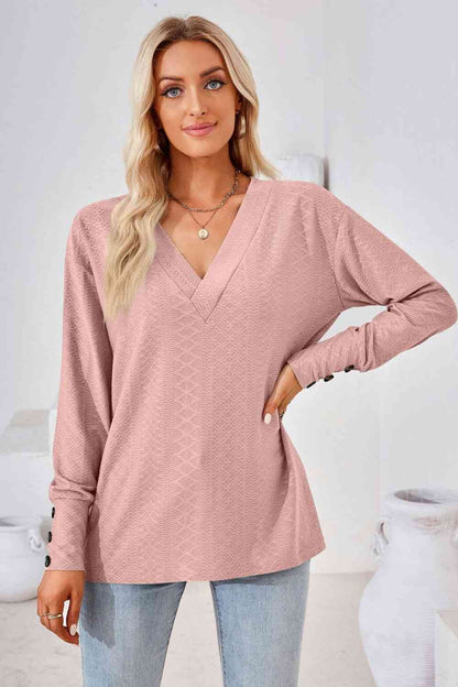 Blusa de manga larga con cuello en V