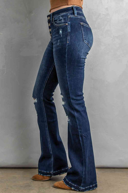 Jean bootcut effet vieilli avec braguette boutonnée