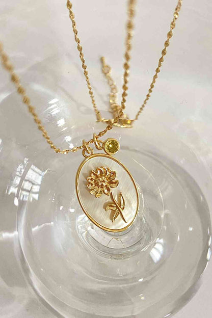 Collier en cuivre avec pendentif en forme de coquille de fleur