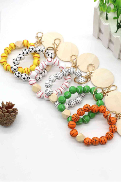 Paquete de 4 llaveros con cuentas en forma de pulsera, surtido