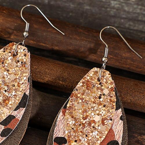 Boucles d'oreilles pendantes à paillettes en forme de feuille en PU