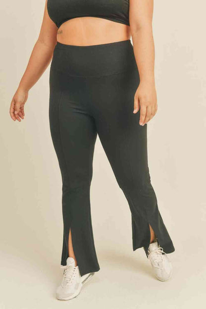 Kimberly C Pantalon évasé fendu pleine taille en noir