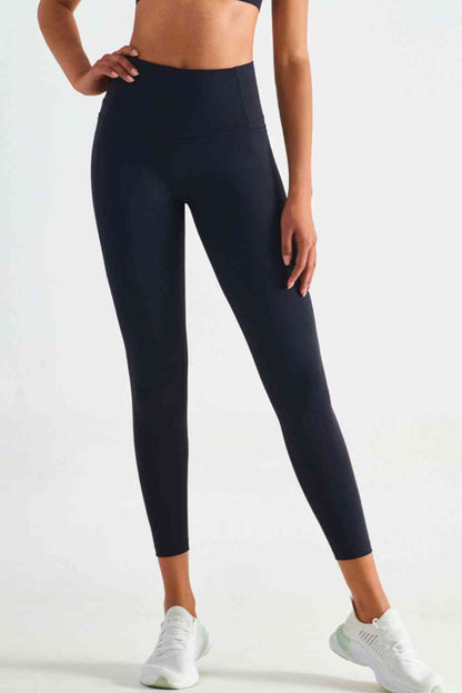 Leggings deportivos de cintura ancha con bolsillos