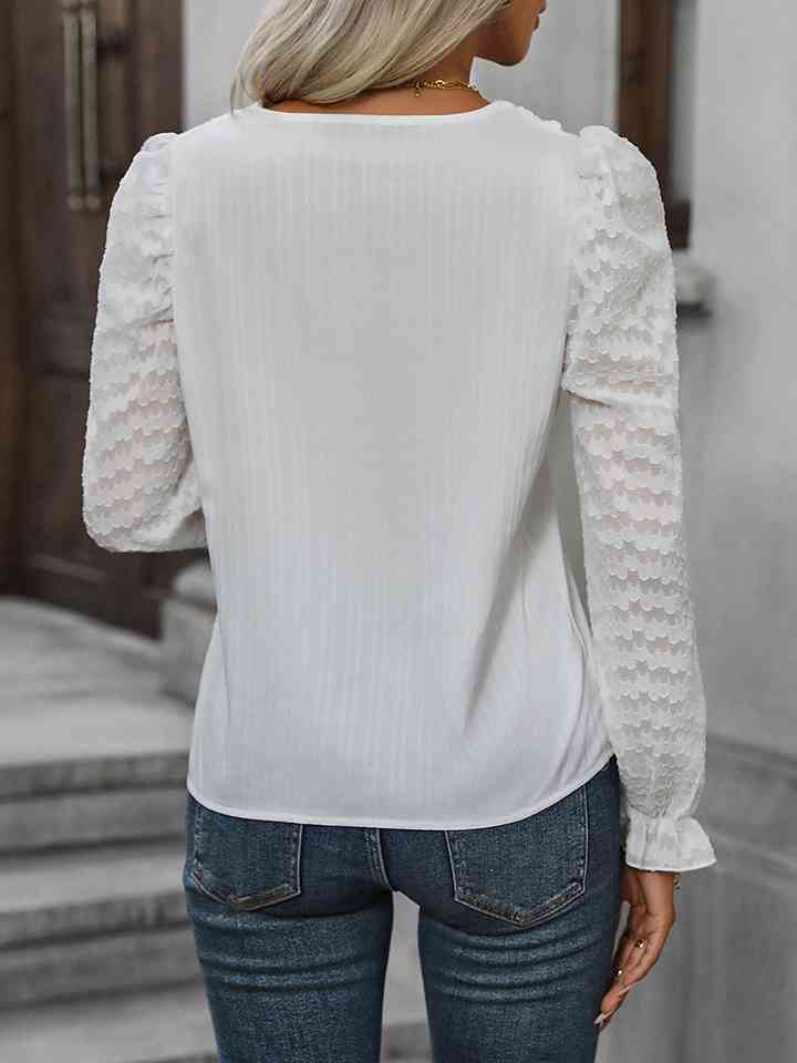 Blouse à manches volantées et col en V