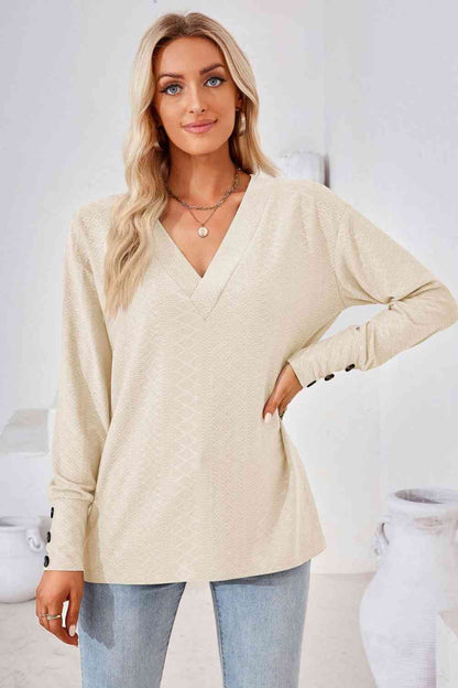 Blusa de manga larga con cuello en V