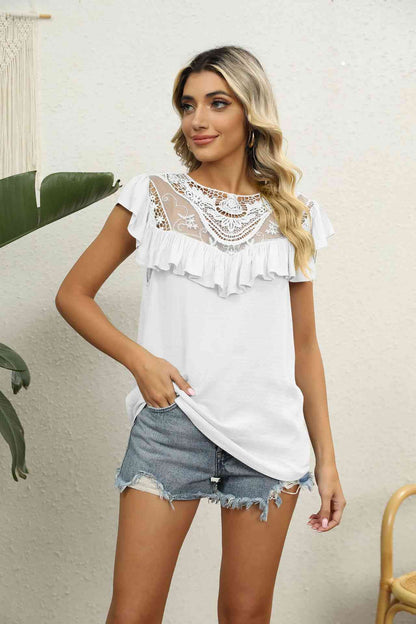 Blusa con volantes y encaje empalmado