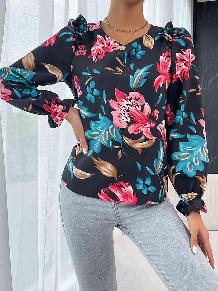 Blouse florale à manches volantées et épaules volantées