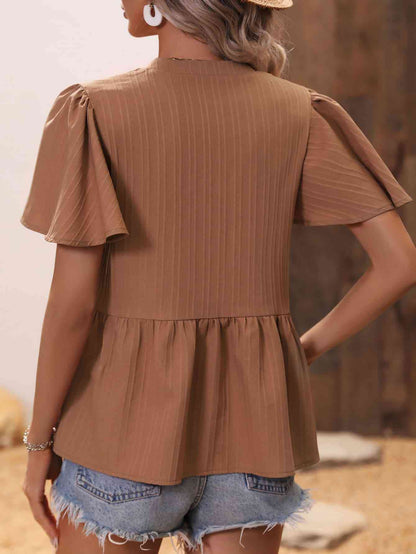 Blusa peplum con muescas y mangas acampanadas de canalé