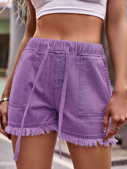 Shorts vaqueros con cordón y dobladillo sin rematar