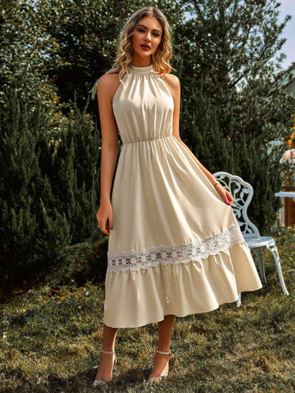 Robe midi en dentelle épissée à col grec