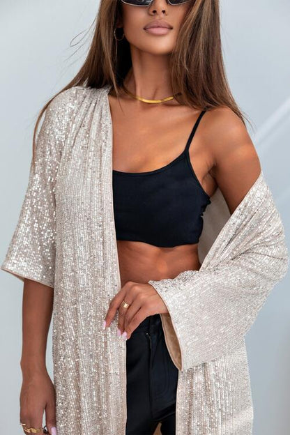 Cardigan cache-poussière ouvert sur le devant à sequins