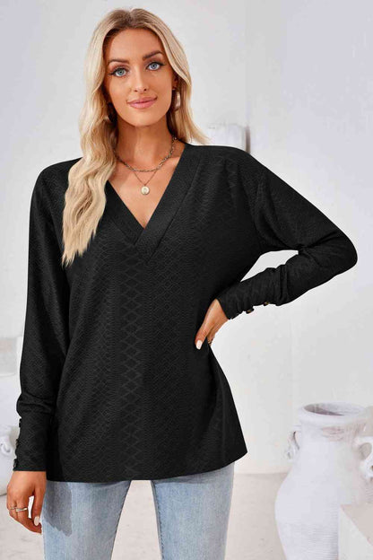 Blusa de manga larga con cuello en V