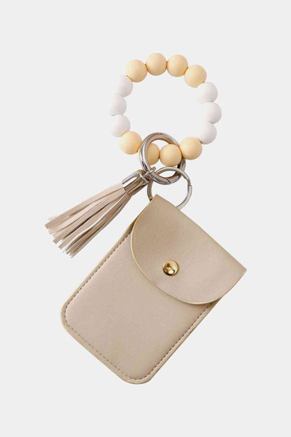 Llavero con pulsera de cuentas y cartera