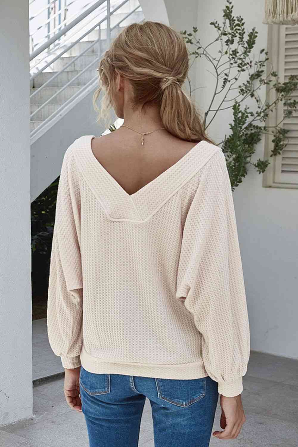 Blouse à manches lanternes en tricot gaufré à col bateau avec poche