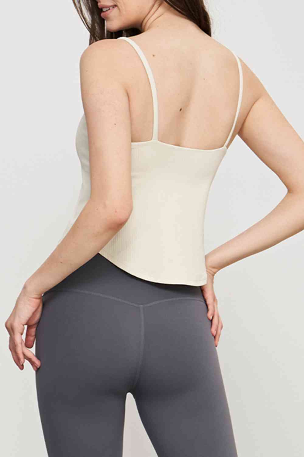 Camisole de sport à ourlet incurvé