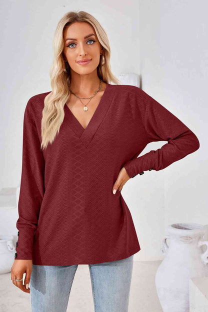 Blusa de manga larga con cuello en V