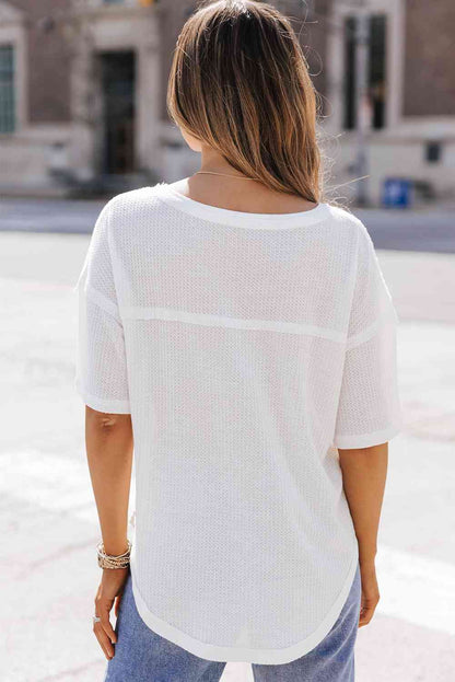 Blusa de hombros caídos con cuello en V y punto tipo gofre