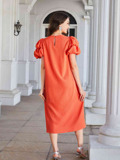 Robe midi à col rond, manches bouffantes et ourlet droit