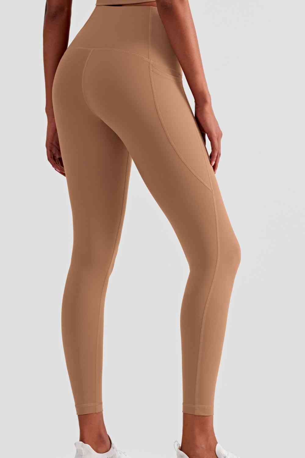 Leggings deportivos de cintura ancha con bolsillos laterales