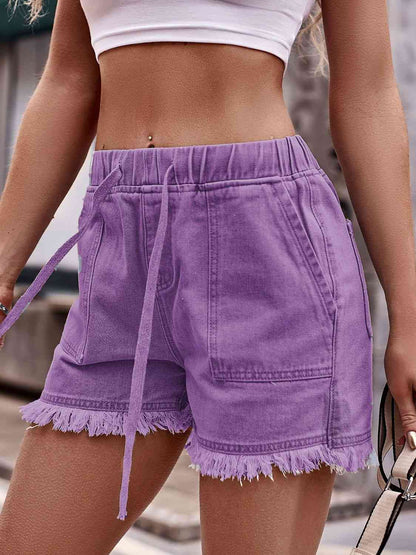 Shorts vaqueros con cordón y dobladillo sin rematar