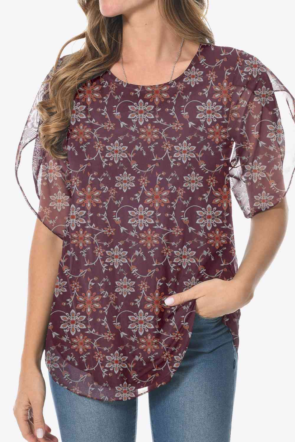 Blusa estampada con cuello redondo y dobladillo redondeado