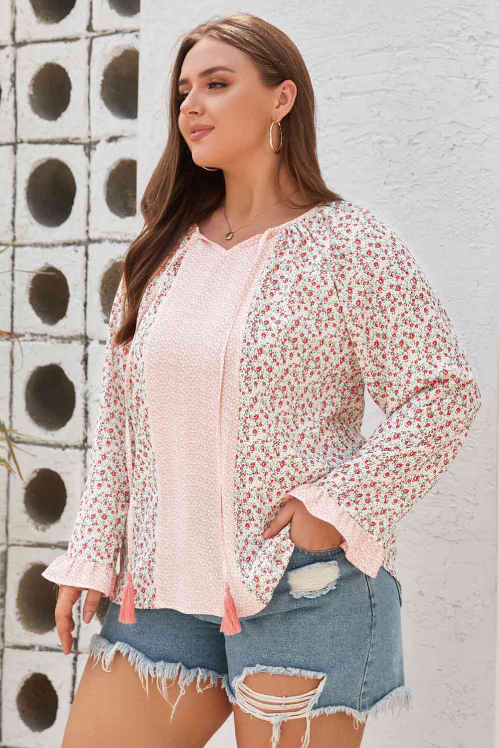 Blusa de manga con volante y borlas de talla grande