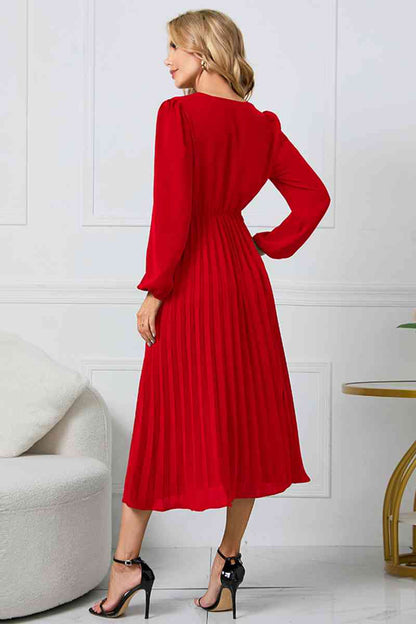 Robe mi-longue à col en V et manches longues avec lien à la taille