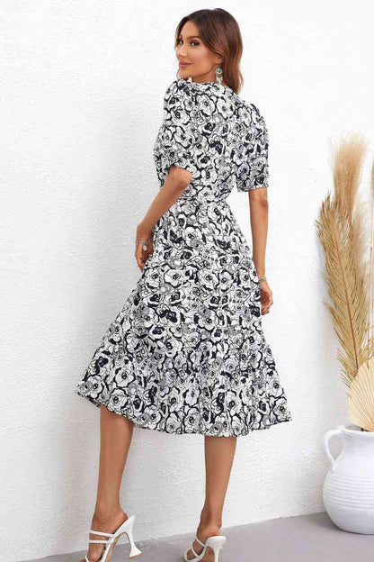 Robe midi fleurie à col et manches bouffantes